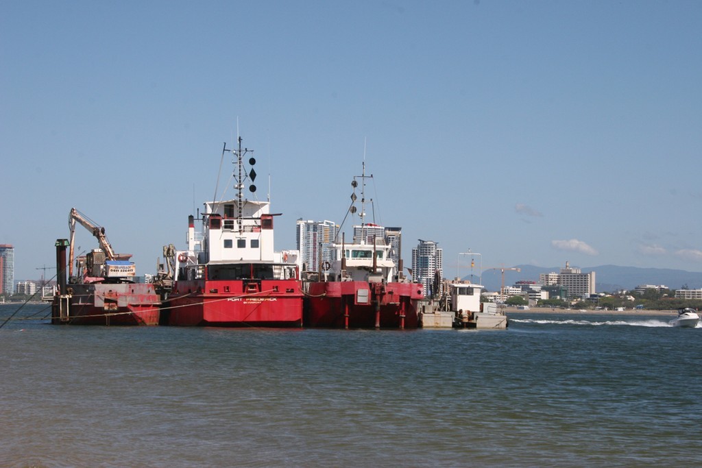 Hall has begun the work to remove sand from channels and dump on shore, where it is useful. © Jeni Bone
